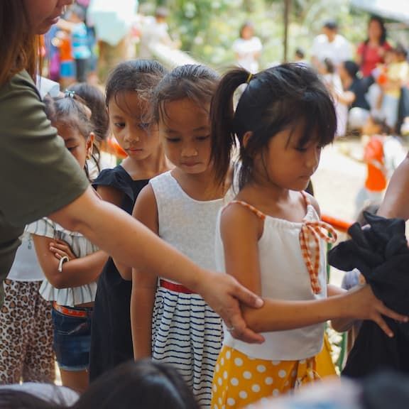 Kids falling in line